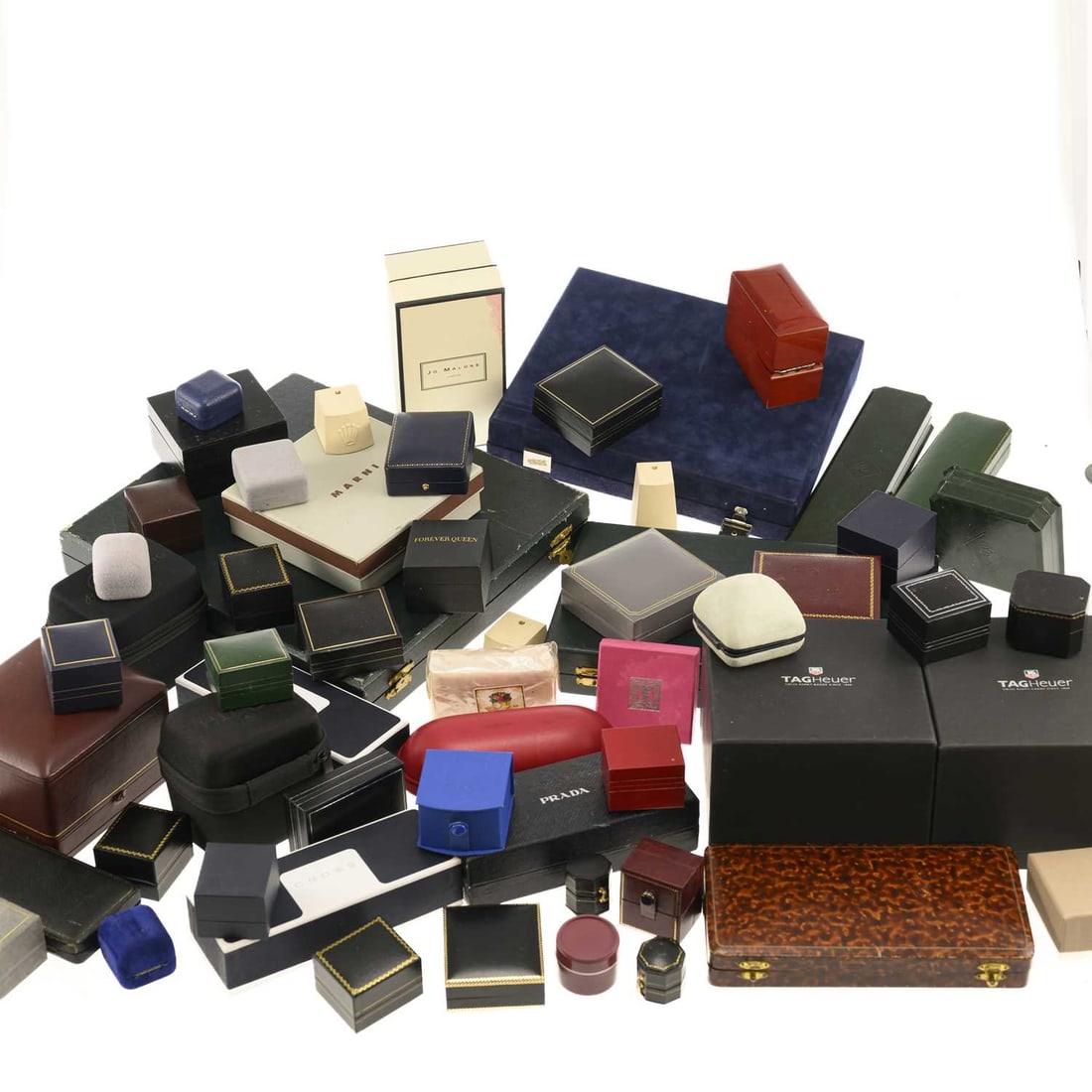 V A GROUP OF JEWELLERY AND WATCH BOXES AND STANDS: V A GROUP OF JEWELLERY AND WATCH BOXES AND STANDS including three Rolex stand bases; a Garrard & Co Ltd bangle or watch box; two Tag Heuer watch boxes, with outer boxes; ring boxes; etc. (Qty)