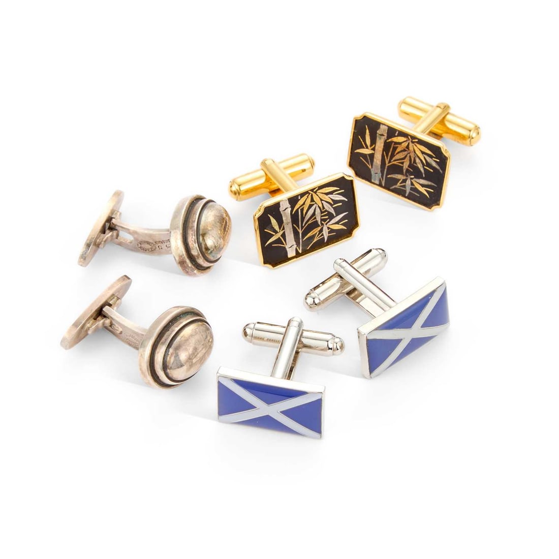 HARALD NIELSEN FOR GEORG JENSEN , A PAIR OF DANISH SILVER CUFFLINKS: HARALD NIELSEN FOR GEORG JENSEN , A PAIR OF DANISH SILVER CUFFLINKS 44B, of plain oval form, with swivel backs, stamped '925S'; together with a pair of Amita damascene gold-plated cufflinks and a