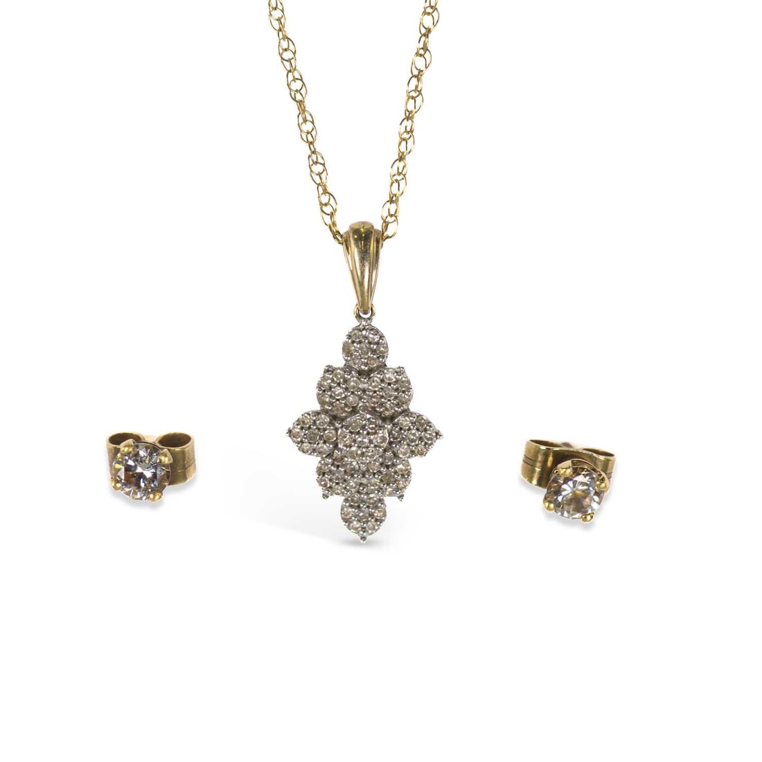 A PAIR OF SOLITAIRE DIAMOND STUD EARRINGS AND A 9 CARAT GOLD DIAMOND CLUSTER PENDANT ON CHAIN: A PAIR OF SOLITAIRE DIAMOND STUD EARRINGS AND A 9 CARAT GOLD DIAMOND CLUSTER PENDANT ON CHAIN comprising the earrings with post fittings; the pendant as a navette cluster, to a fine chain,