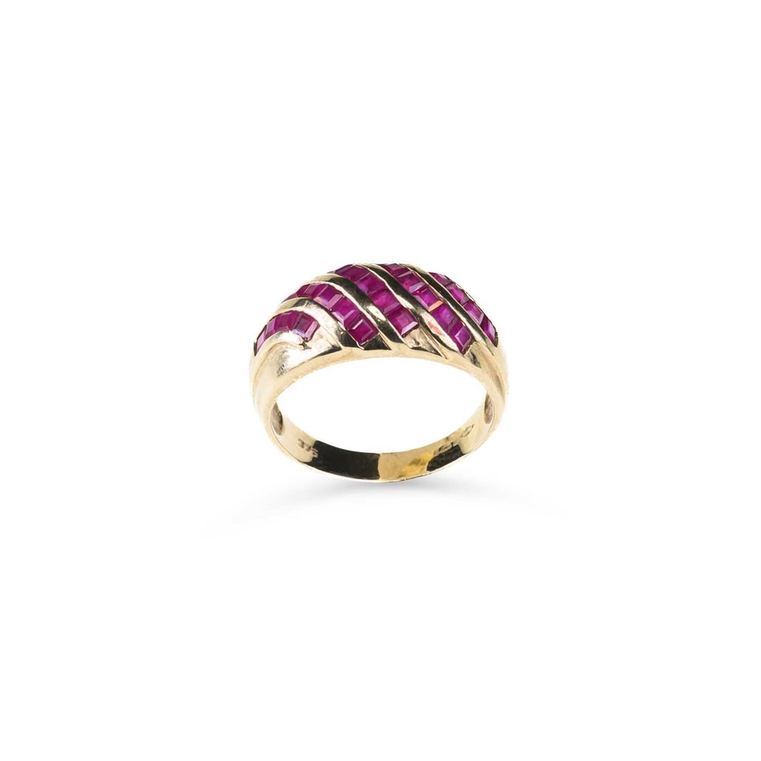 A 9 CARAT GOLD RUBY RING: A 9 CARAT GOLD RUBY RING scrolling bands of calibre-cut rubies to a tapering band, hallmarked import Sheffield 1998. Ring size P, 4.2 grams Good condition