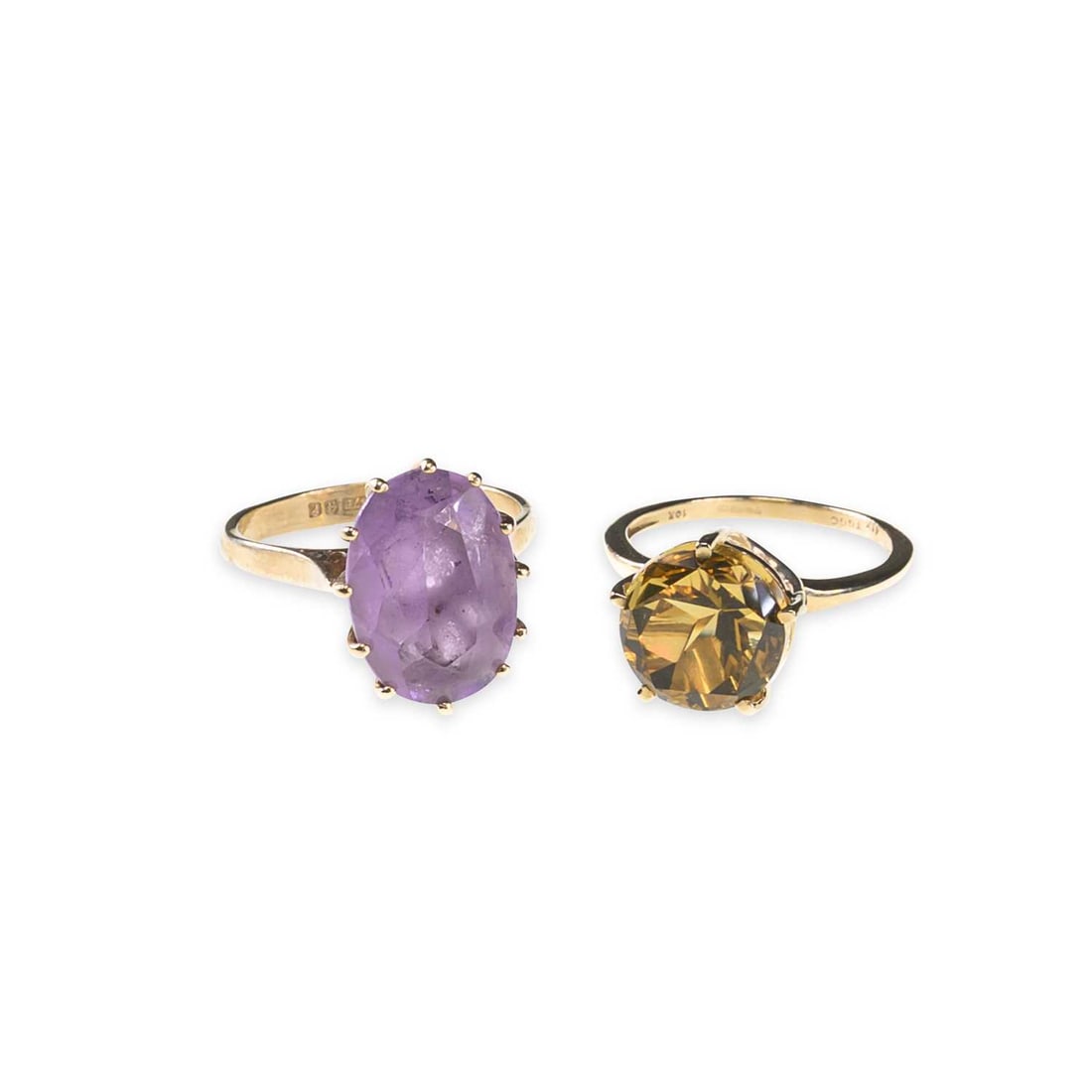 TWO 9 CARAT GOLD GEM-SET RINGS: TWO 9 CARAT GOLD GEM-SET RINGS comprising a citrine ring, hallmarked; and an amethyst ring, hallmarked. (2) Ring size L1/2 and J1/2, 5.8 grams gross Good condition