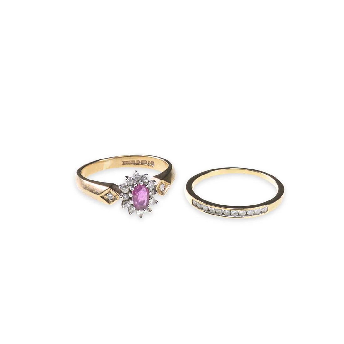 TWO 9 CARAT GOLD GEM-SET RINGS: TWO 9 CARAT GOLD GEM-SET RINGS comprising a ruby and diamond cluster ring, hallmarked; and a diamond half hoop ring, stamped '375', hallmarked. (2) Ring sizes K and J1/2, 4 grams gross Good condition