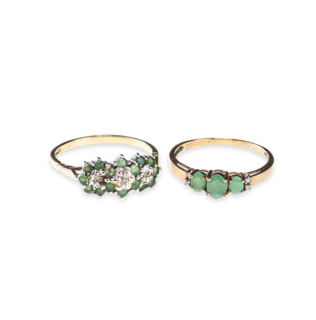 TWO 9 CARAT GOLD GEM-SET RINGS: TWO 9 CARAT GOLD GEM-SET RINGS comprising an emerald three stone ring with diamond accents, hallmarked; and an emerald and diamond triple cluster ring, hallmarked. (2) Ring sizes Q and S, 4.1 grams gr