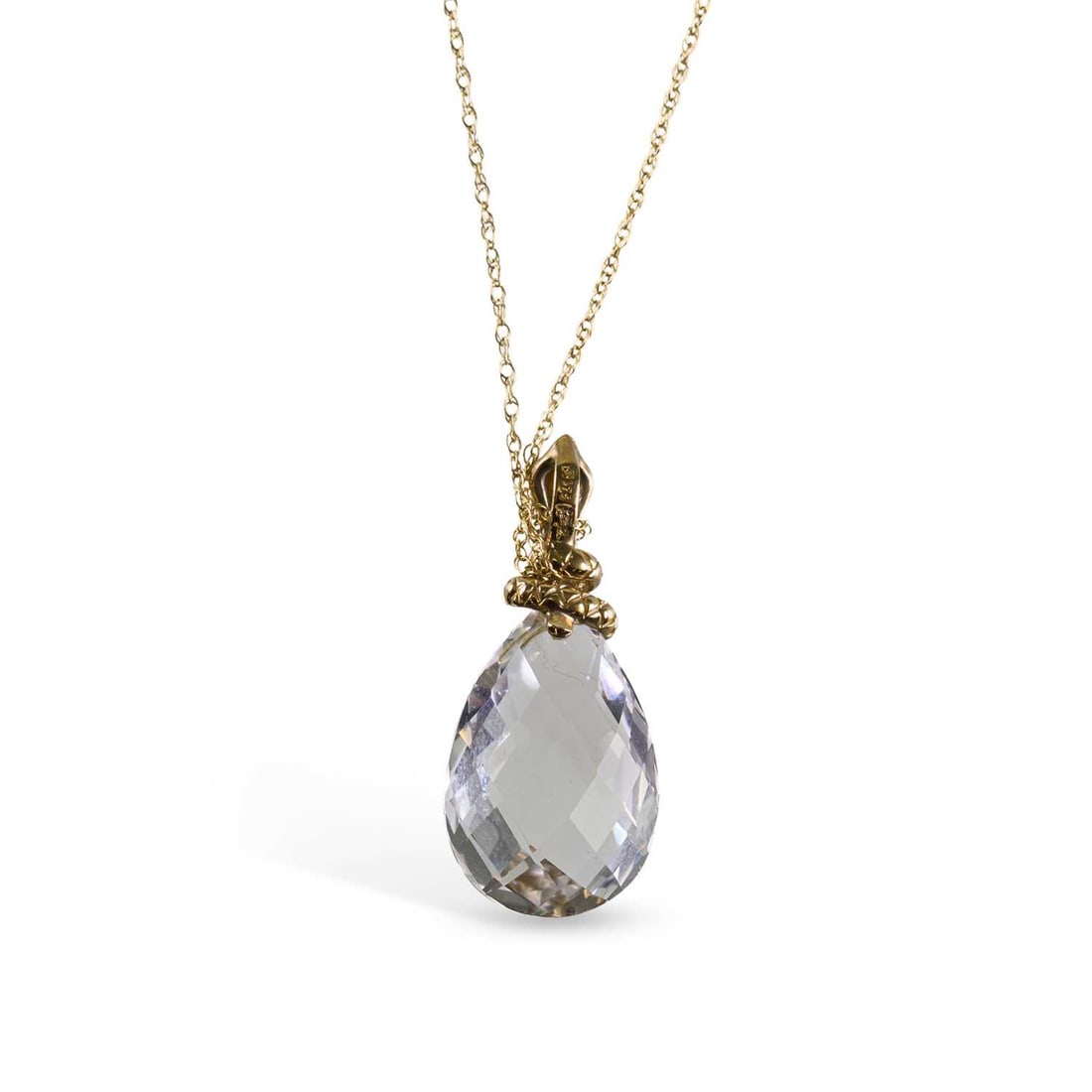 A 9 CARAT GOLD ROCK CRYSTAL PENDANT ON CHAIN: A 9 CARAT GOLD ROCK CRYSTAL PENDANT ON CHAIN a mixed pear-cut rock crystal to a coiled snake bail, to a fine chain, hallmarked. Pendant 3.3cm long, 5.3 grams Good condition