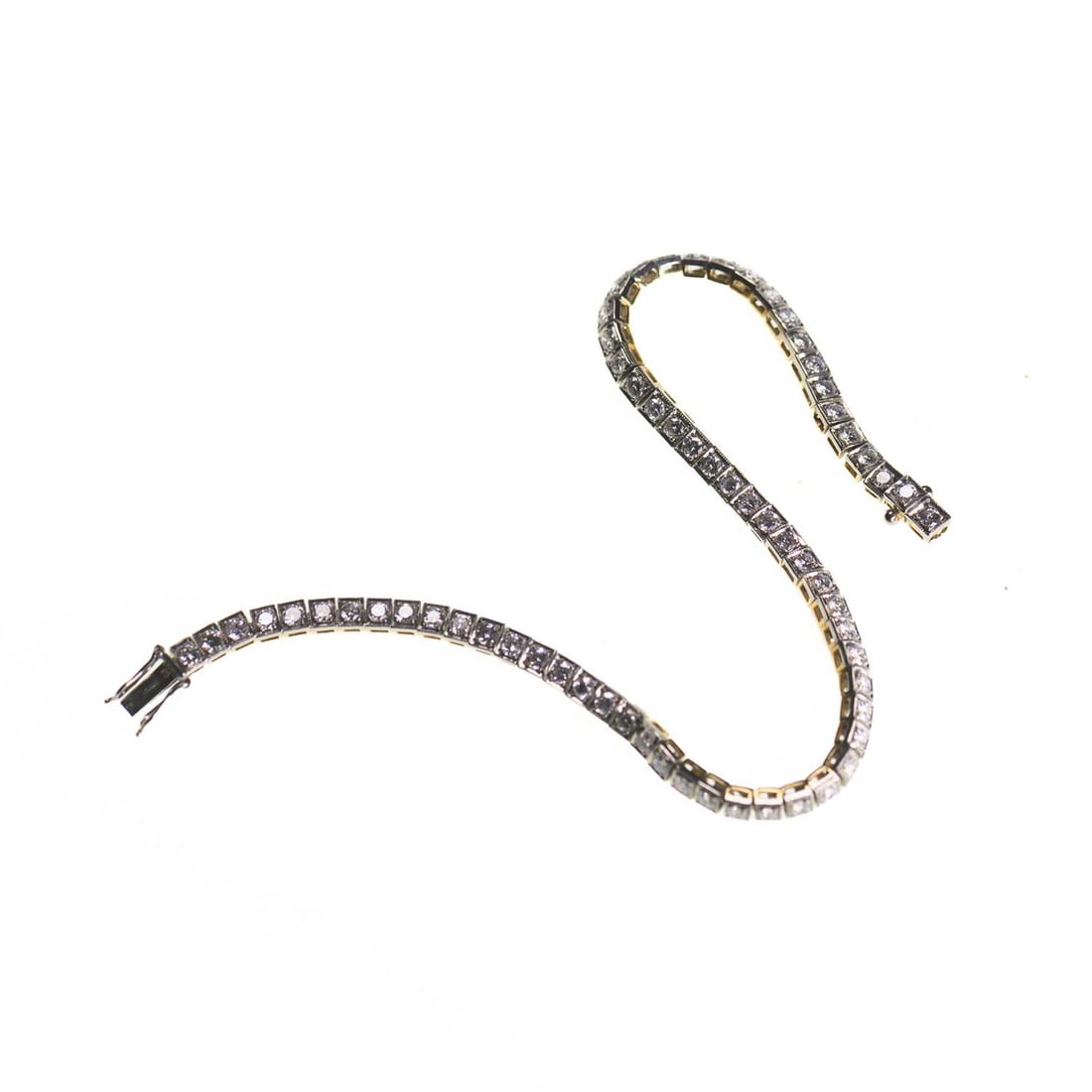 A DIAMOND TENNIS BRACELET (1 of 2)