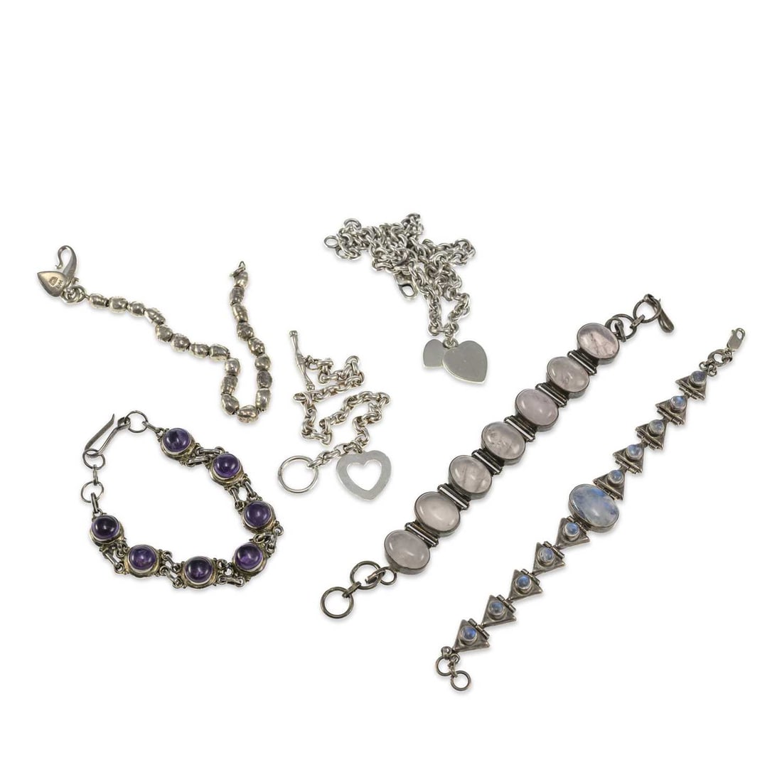 A GROUP OF SILVER BRACELETS (1 of 1)