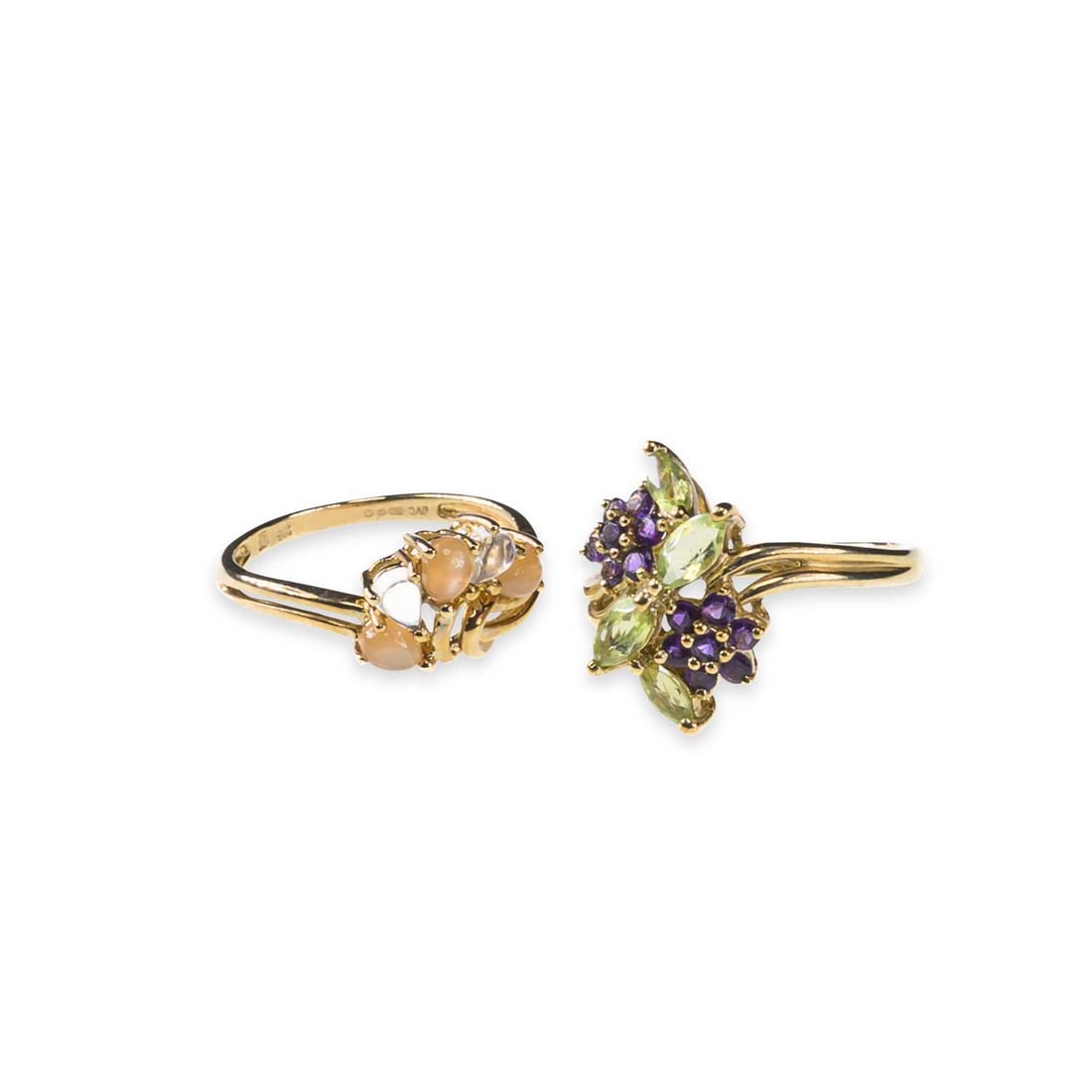 TWO 9 CARAT GOLD GEM-SET RINGS: TWO 9 CARAT GOLD GEM-SET RINGS comprising an amethyst and peridot cluster ring, hallmarked; and a moonstone ring, hallmarked. (2) Ring sizes M and N, 5.1 grams gross Good condition