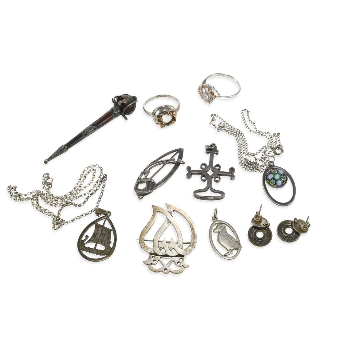A GROUP OF SCOTTISH AND WELSH SILVER JEWELLERY: A GROUP OF SCOTTISH AND WELSH SILVER JEWELLERY including two Clogau ring; an Ola Gorie Mackintosh Rose pendant; a pair of Ola Gorie circular drop stud earrings; etc. (11) Earrings 2.2cm long, 48