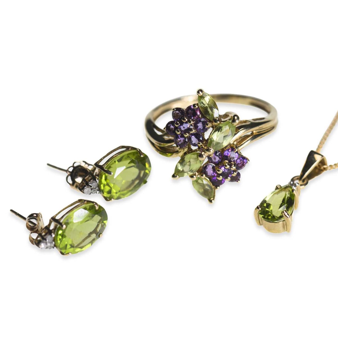 A GROUP OF GEM-SET JEWELLERY: A GROUP OF GEM-SET JEWELLERY comprising a peridot and amethyst cluster ring; a pear-cut peridot and diamond pendant on chain; and a pair of peridot and diamond stud earrings, earrings with post