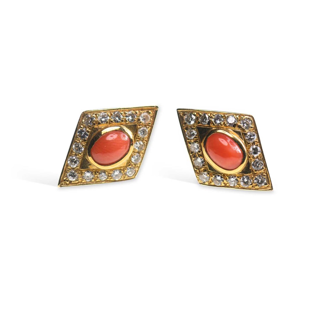 A PAIR OF CORAL AND DIAMOND STUD EARRINGS: A PAIR OF CORAL AND DIAMOND STUD EARRINGS oval coral within kite-shaped frames set with round brilliant-cut diamonds, with post fittings, unmarked. Estimated total diamond weight 0.65 carat, 2cm long,