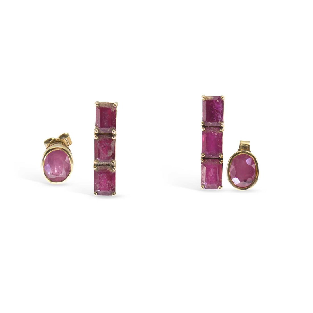 TWO PAIRS OF 9 CARAT GOLD GEM-SET EARRINGS: TWO PAIRS OF 9 CARAT GOLD GEM-SET EARRINGS comprising a pair of ruby bar stud earrings; and a pair of oval-cut ruby stud earrings, with post fittings. (2) 2.3cm long and smaller, 5.7 grams gross Good 