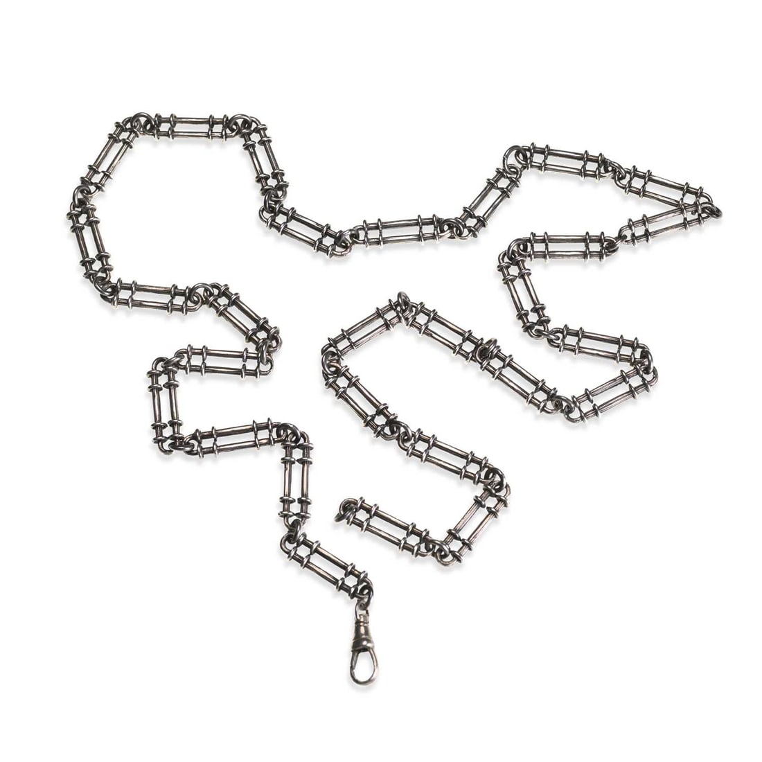 A LATE VICTORIAN FANCY LINK ALBERT CHAIN NECKLACE: A LATE VICTORIAN FANCY LINK ALBERT CHAIN NECKLACE of elongated belcher links, with dog clip, unmarked. 62cm long, 34.7 grams Good condition