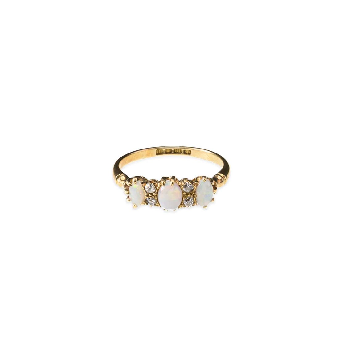 AN EDWARDIAN 18 CARAT GOLD OPAL AND DIAMOND RING: AN EDWARDIAN 18 CARAT GOLD OPAL AND DIAMOND RING three oval opals spaced by pairs of old-cut diamonds, to notched shoulders, hallmarked London 1904. Ring size O, 3.1 grams Good condition