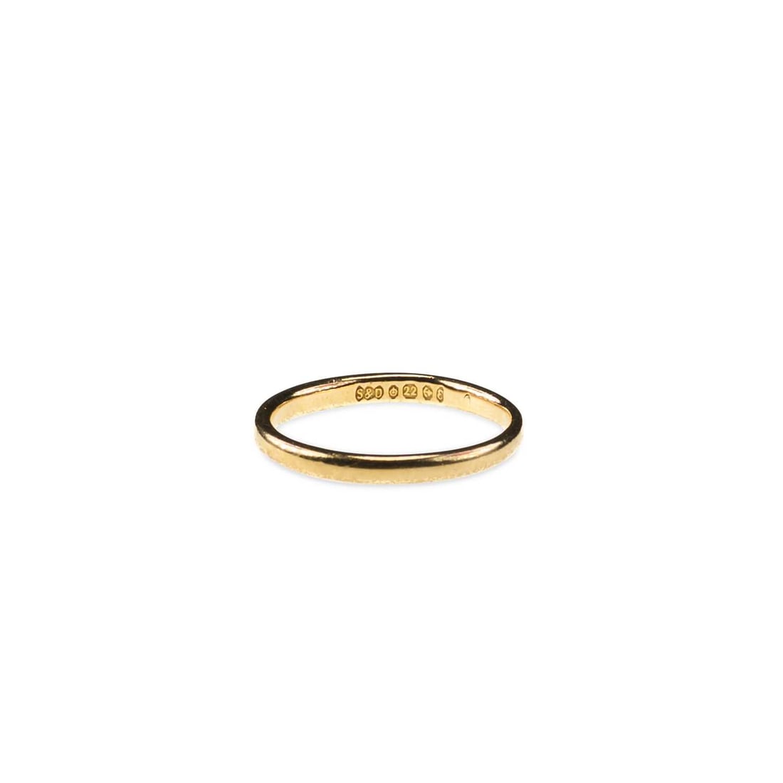 A 22 CARAT GOLD BAND RING: A 22 CARAT GOLD BAND RING hallmarked Birmingham 1979. Ring size F1/2, 2.1 grams Good condition