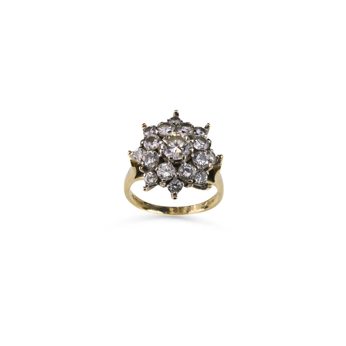 AN 18 CARAT GOLD DIAMOND CLUSTER RING: AN 18 CARAT GOLD DIAMOND CLUSTER RING a round brilliant-cut diamond within a border of smaller diamonds, hallmarked London 1992. Estimated total diamond weight 2.00 carat, ring size K, 4.1 grams Good
