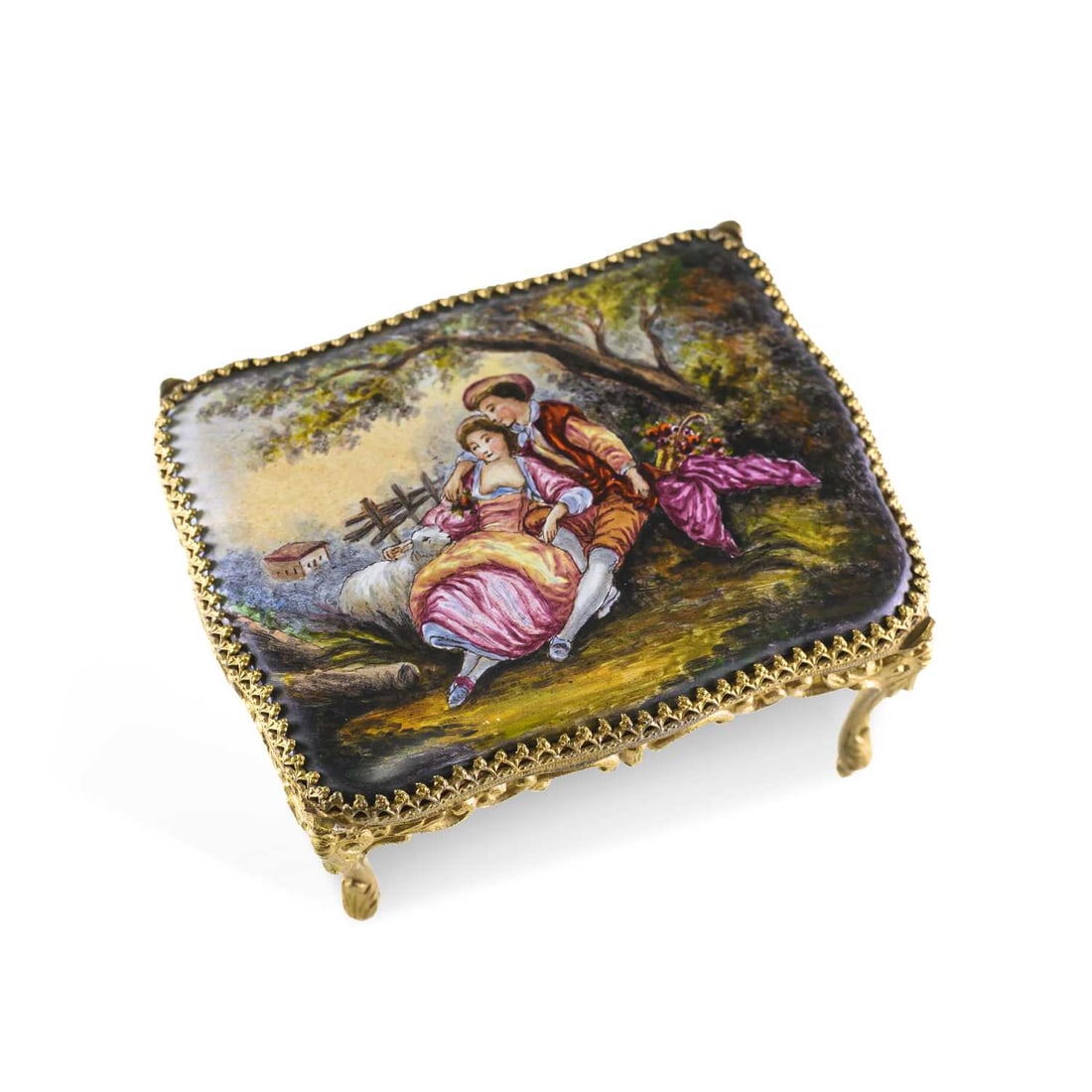 A CONTINENTAL GILT-METAL AND ENAMEL MUSICAL MINIATURE TABLE LATE 19TH CENTURY: A CONTINENTAL GILT-METAL AND ENAMEL MUSICAL MINIATURE TABLE LATE 19TH CENTURY the rectangular top painted with a courting couple in a pastoral landscape, raised on an ornate pierced frieze and four ca