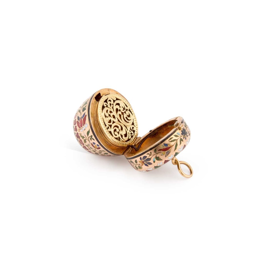 A GOLD AND ENAMEL VINAIGRETTE CIRCA 1790: A GOLD AND ENAMEL VINAIGRETTE CIRCA 1790 egg-shaped, finely enamelled with a continuous floral motif, opening to reveal an inner cover with reticulated scrollwork. 3.5cm high overall, 13 grams