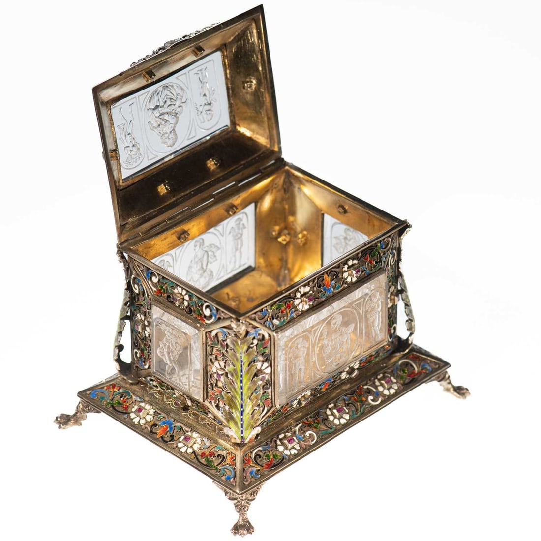 A 19TH CENTURY VIENNESE ENAMELLED, PARCEL-GILT SILVER-MOUNTED ROCK CRYSTAL JEWEL CASKET (1 of 3)