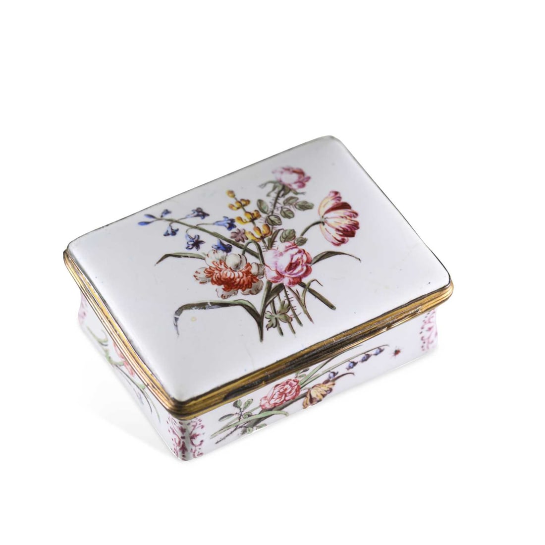 A RARE BATTERSEA ENAMEL SNUFF BOX CIRCA 1755: A RARE BATTERSEA ENAMEL SNUFF BOX CIRCA 1755 of rectangular form, painted with flower sprays to the cover, sides and base, the underside of the cover with a puce floral spray. 7.5cm wide
