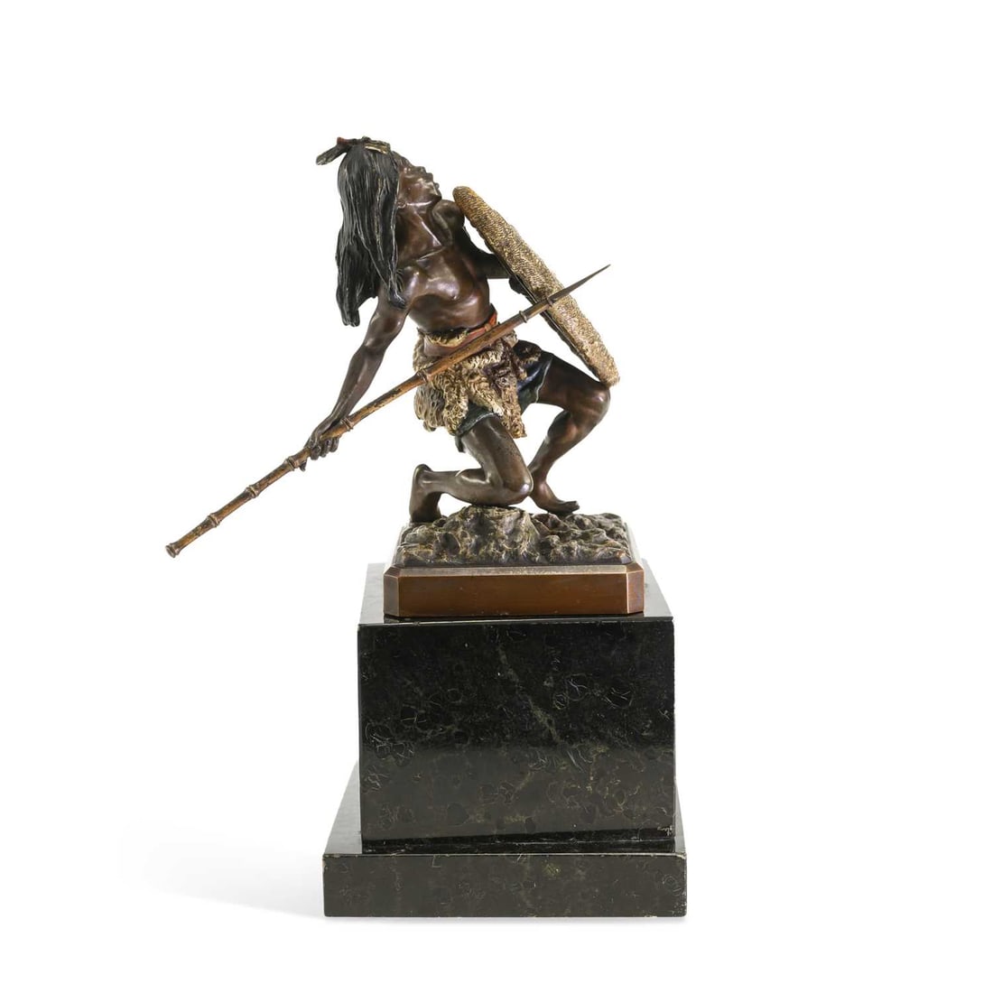 FRANZ BERGMAN (AUSTRIAN 1861 -1936), A COLD PAINTED BRONZE OF A WARRIOR CIRCA 1910: FRANZ BERGMAN (AUSTRIAN 1861 -1936), A COLD PAINTED BRONZE OF A WARRIOR CIRCA 1910 modelled as a crouching warrior behind a shield and brandishing a spear, set upon a squared marble base, stamped foun