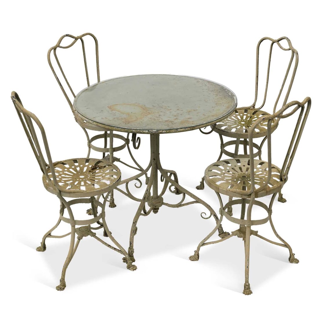 A PAINTED WROUGHT IRON GARDEN TABLE AND FOUR CHAIRS: A PAINTED WROUGHT IRON GARDEN TABLE AND FOUR CHAIRS the glass-topped circular table with a quadform base. (5) Table 72cm high, 81cm diameter