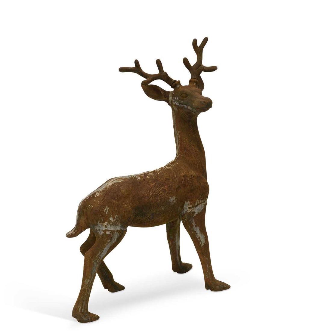 A LARGE CAST IRON MODEL OF A STAG: A LARGE CAST IRON MODEL OF A STAG modelled standing, head turned to the right, with remnants of green paint. 106cm high overall