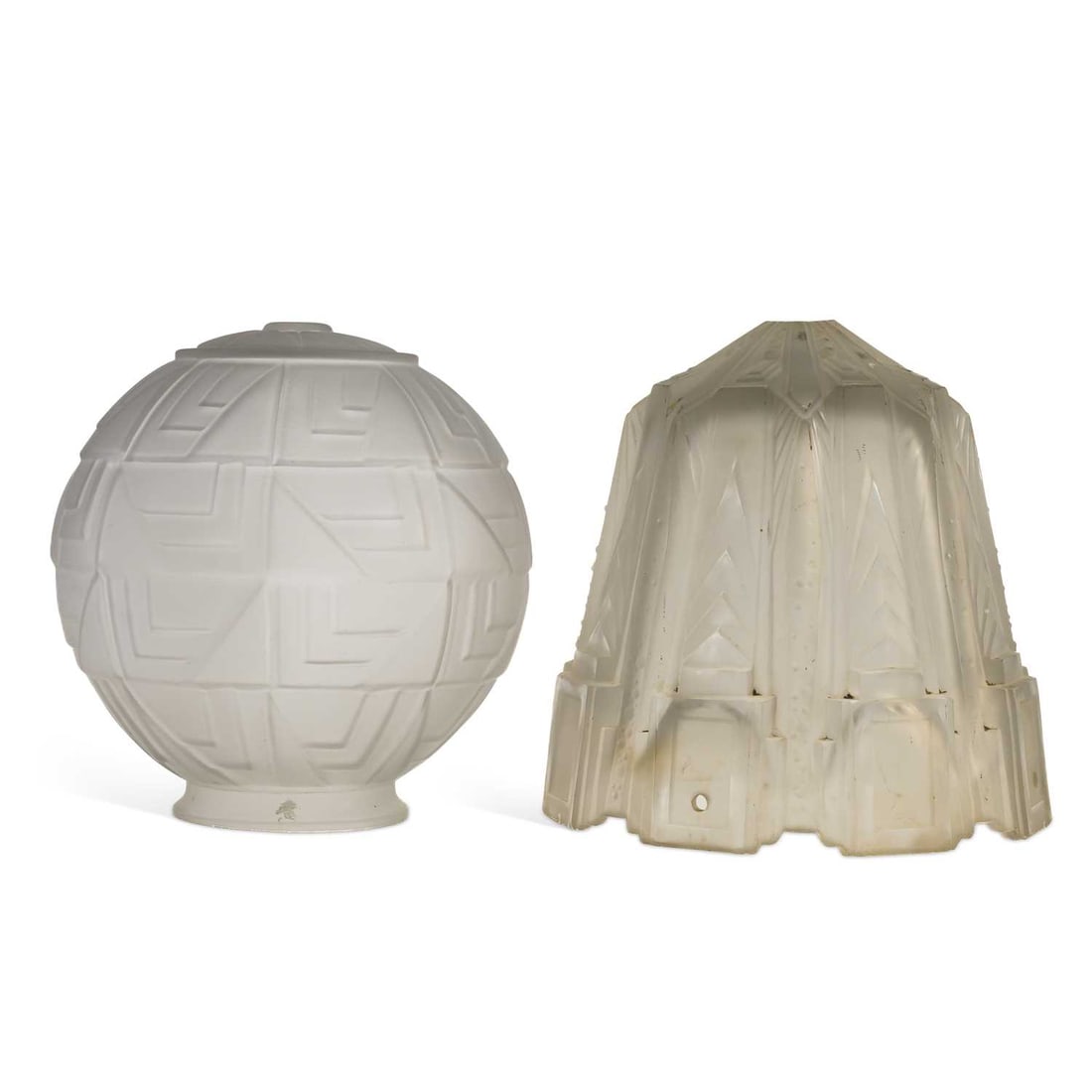 V TWO LARGE ART DECO LIGHT SHADES: V TWO LARGE ART DECO LIGHT SHADES comprising the first globular with stepped geometric decoration, frosted and moulded, unsigned; the second tapering octagonal with rectangular and chevron decoration,
