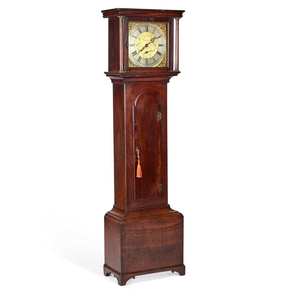 A THIRTY-HOUR LONGCASE CLOCK SIGNED TOBIAS FLETCHER, BARNSLEY: A THIRTY-HOUR LONGCASE CLOCK SIGNED TOBIAS FLETCHER, BARNSLEY the 12-inch square brass dial with subsidiary date, the flat hood with columns, and the case with an arch-top trunk door. 181cm high With 