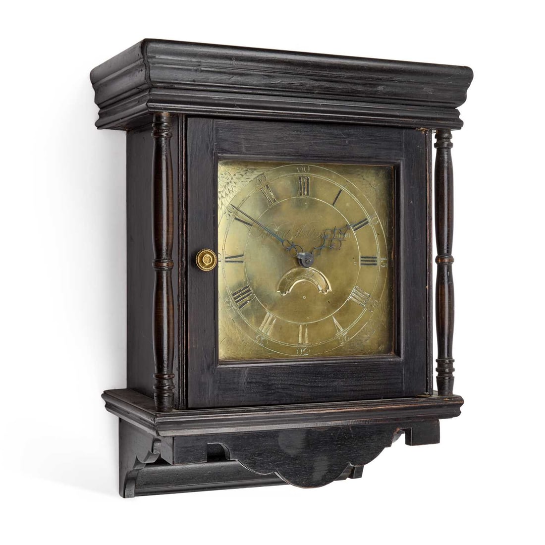 AN EBONISED THIRTY-HOUR WALL CLOCK SIGNED ROBERT SKELTON, MALTON: AN EBONISED THIRTY-HOUR WALL CLOCK SIGNED ROBERT SKELTON, MALTON the 10-inch square brass dial with date crescent. 56cm high No weight or pendulum.