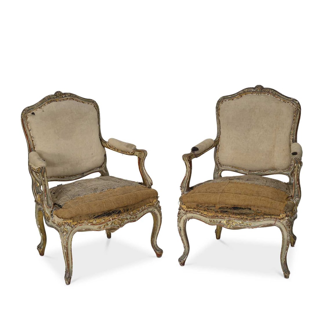 A PAIR OF PAINTED AND PARCEL-GILT FAUTEUILS (1 of 1)