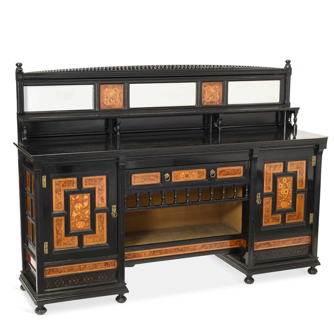 A VICTORIAN AESTHETIC EBONISED AND INLAID SIDEBOARD, CIRCA 1870 STAMPED GILLOWS LANCASTER, PROBABLY: A VICTORIAN AESTHETIC EBONISED AND INLAID SIDEBOARD, CIRCA 1870 STAMPED GILLOWS LANCASTER, PROBABLY DESIGNED BY BRUCE TALBERT with a mirrored superstructure above a moulded rectangular top over a draw