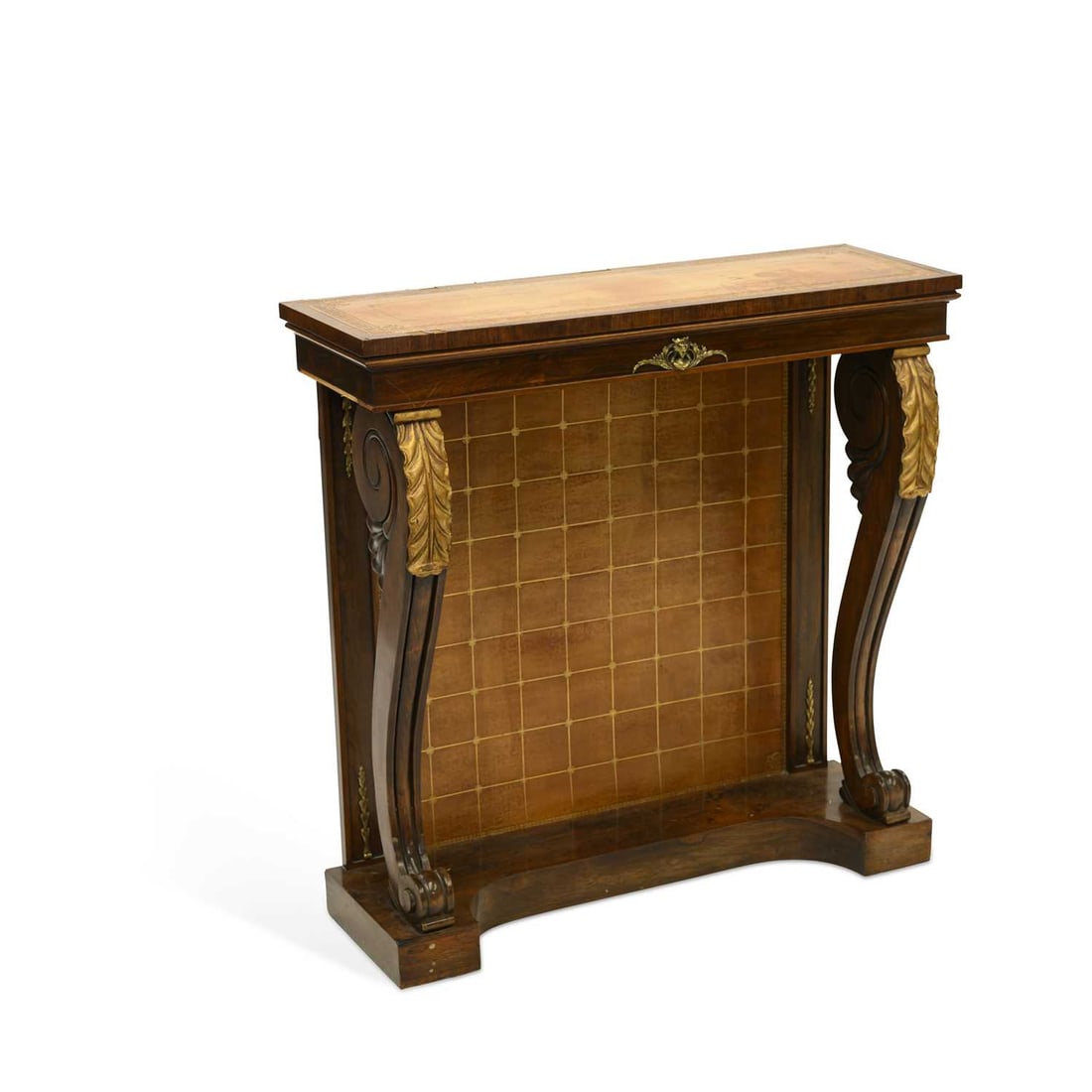A REGENCY PARCEL-GILT, LEATHER-INSET AND ROSEWOOD CONSOLE TABLE: A REGENCY PARCEL-GILT, LEATHER-INSET AND ROSEWOOD CONSOLE TABLE the rectangular leather-inset top with a gilt-tooled Greek Key border, raised on leaf-capped scroll-form legs. 90cm high, 90.5cm wide,