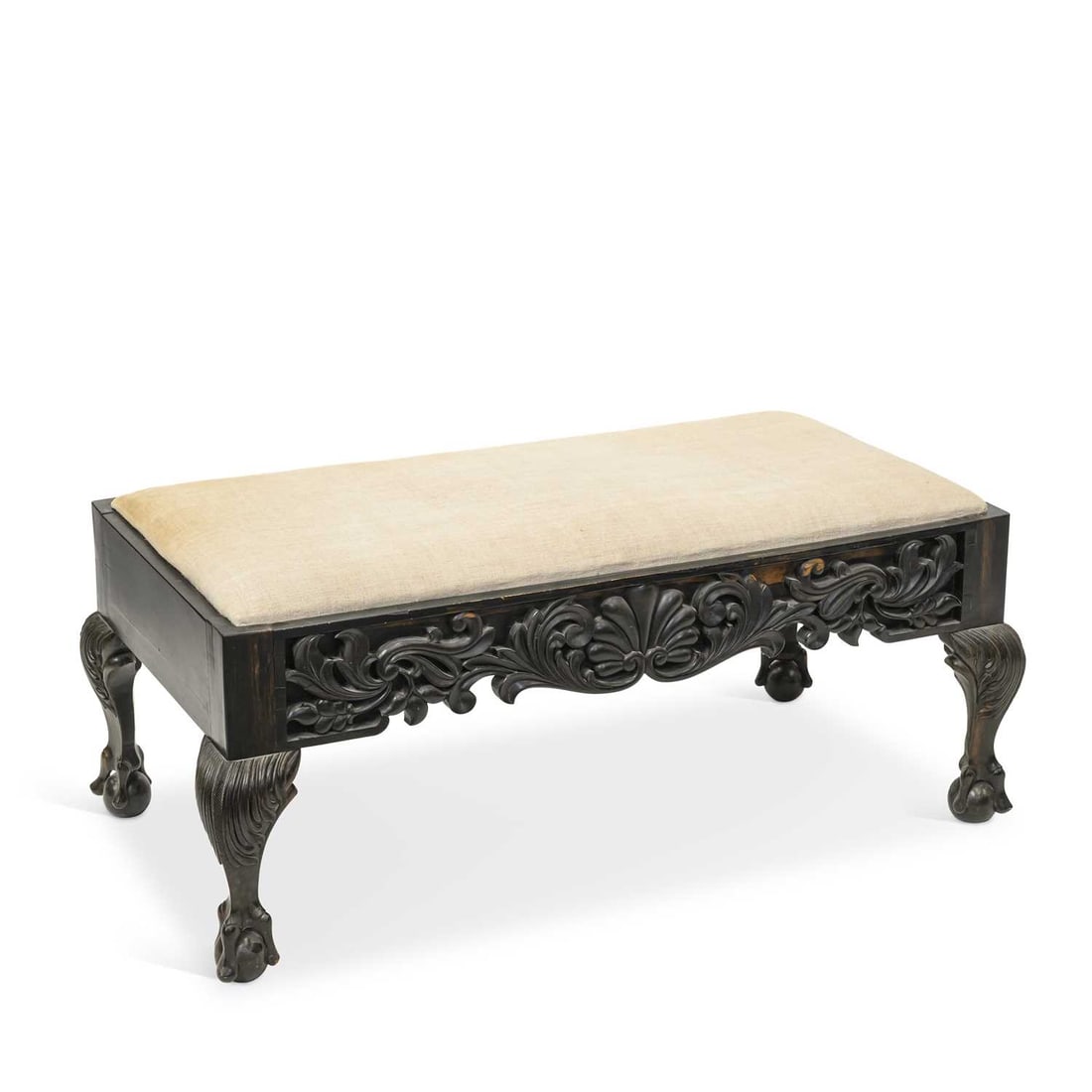 A COLONIAL COROMANDEL CENTRE STOOL CIRCA 1870, PROBABLY INDIA OR SRI LANKA: A COLONIAL COROMANDEL CENTRE STOOL CIRCA 1870, PROBABLY INDIA OR SRI LANKA with a drop-in seat, anthemion and acanthus carved friezes on two sides, cabriole legs, terminating in claw and ball feet. 56