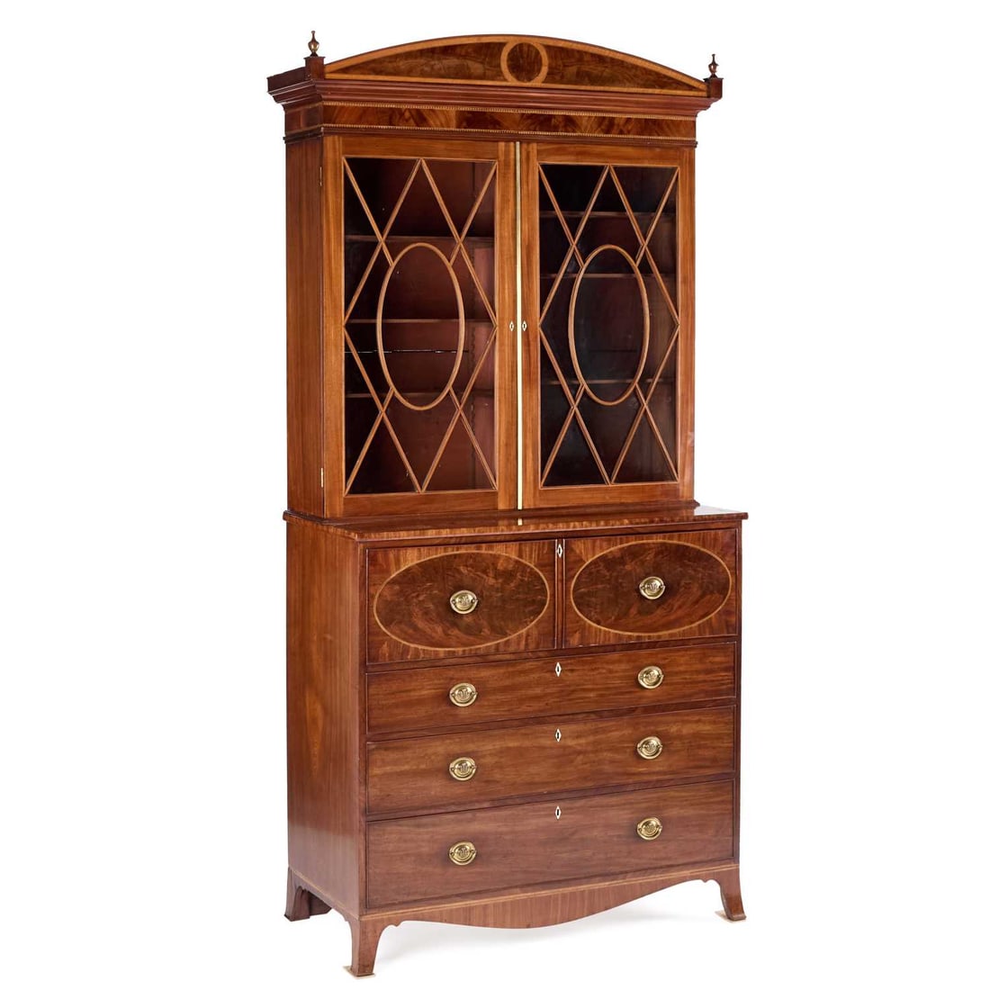 A GEORGE III INLAID MAHOGANY SECRETAIRE BOOKCASE: A GEORGE III INLAID MAHOGANY SECRETAIRE BOOKCASE the upper section with an arched pediment flanked by turned finials, the doors with attractive glazing bars, the base with a well-fitted secretaire