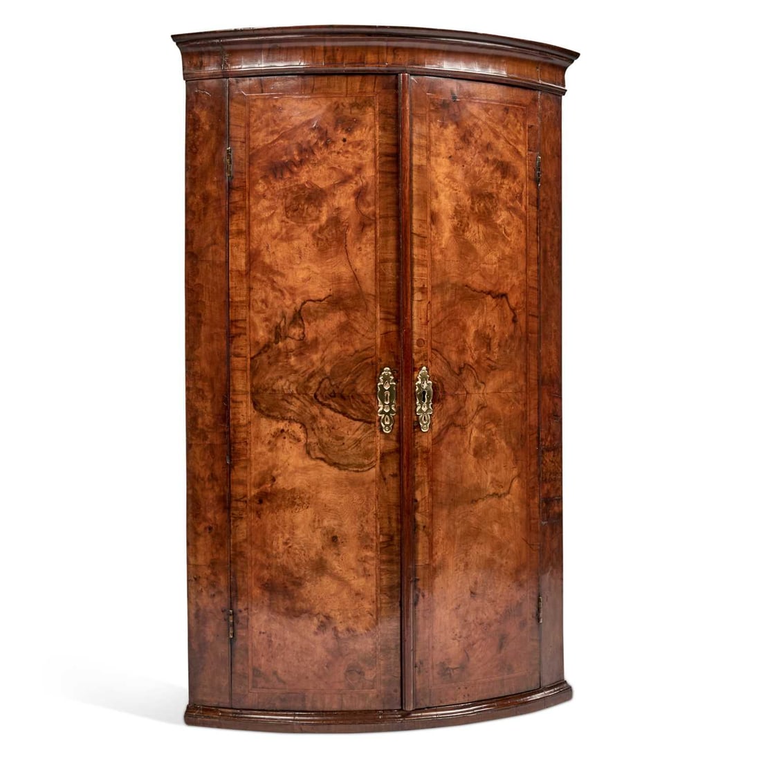 AN EARLY 18TH CENTURY WALNUT BOW-FRONT HANGING CORNER CUPBOARD (1 of 1)
