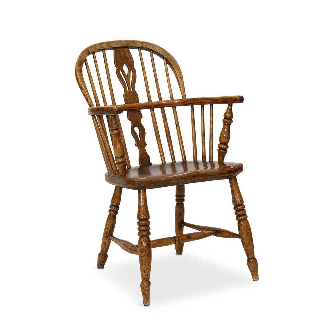 A 19TH CENTURY ELM AND OAK WINDSOR CHAIR: A 19TH CENTURY ELM AND OAK WINDSOR CHAIR with a well figured seat, raised on splayed ring turned legs, joined by an H-form stretcher. Height of back 90cm
