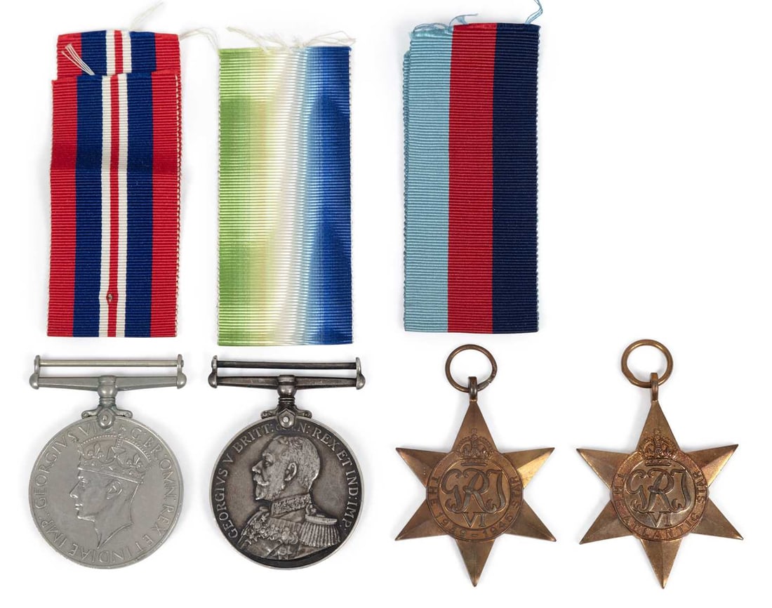A FIRST WORLD WAR AND SECOND WORLD WAR CASUALTY MEDAL GROUP: formed of a George V Navy Long Service and Good Conduct Medal, Second World War War Medal, 1939-1945 Star and a Atlantic Star, in the box of issue, awarded to K. 6655 H.N. Wadsworth L. Sto. H.M.S. Eag