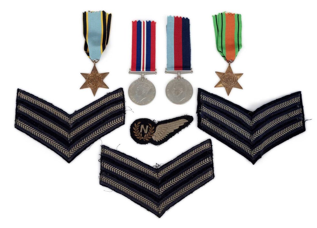 A SECOND WORLD WAR MEDAL GROUP: the group formed of a War Medal, Defence Medal, 1939-45 Star and an Air Crew Europe Star, within a box of issue named F.H.R. Lee; together with a RAF navigator brevet and three Sgt. stripes cloth badg