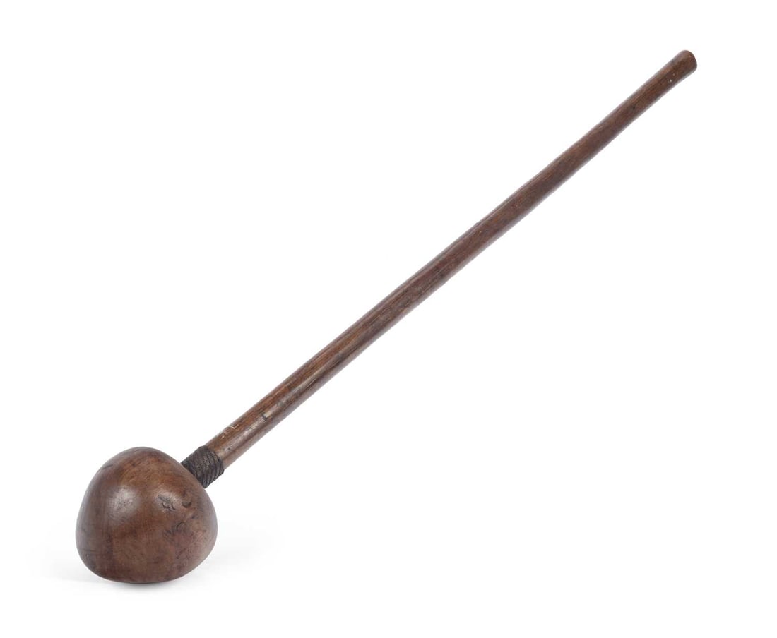 A SOUTHERN AFRICAN HARDWOOD KNOBKERRIE: the bulbous head above a tapering shaft, the neck closely bound with twisted wire. 78cm long