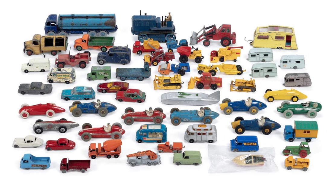 A COLLECTION OF DIECAST VEHICLES: including a Dinky Vanwall 239 racing car; a Dinky Ferrari 23H, a Dinky Talbot Lago 23K; Matchbox Crane Truck No. 30; Matchbox Morris J2 Pick-Up No. 60; Matchbox Jaguar XK140; etc. (Qty)