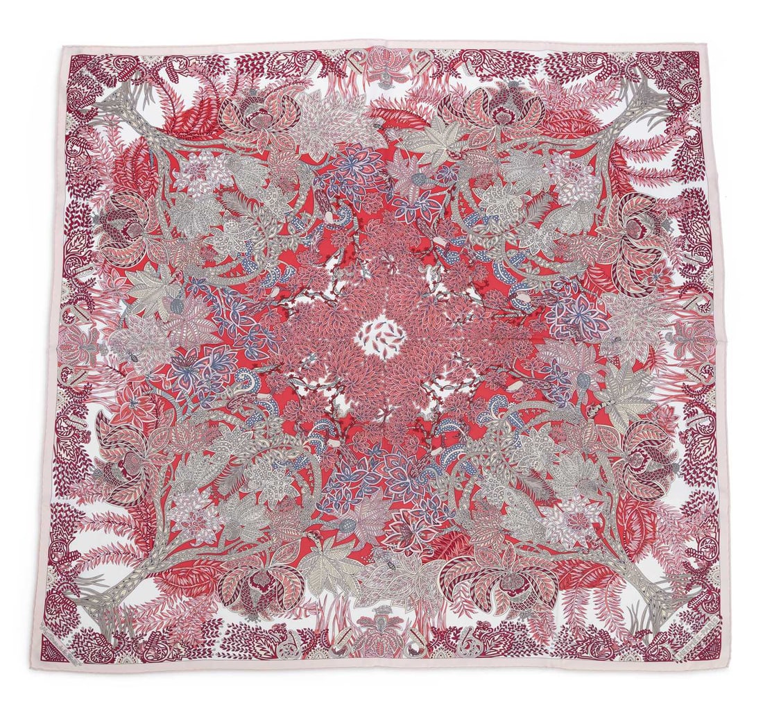 A HERMES MAITRES DE LA FORET SILK SCARF: designed by Annie Faivre, pink, red, cream and blue colourway, boxed. 90cm by 90cm