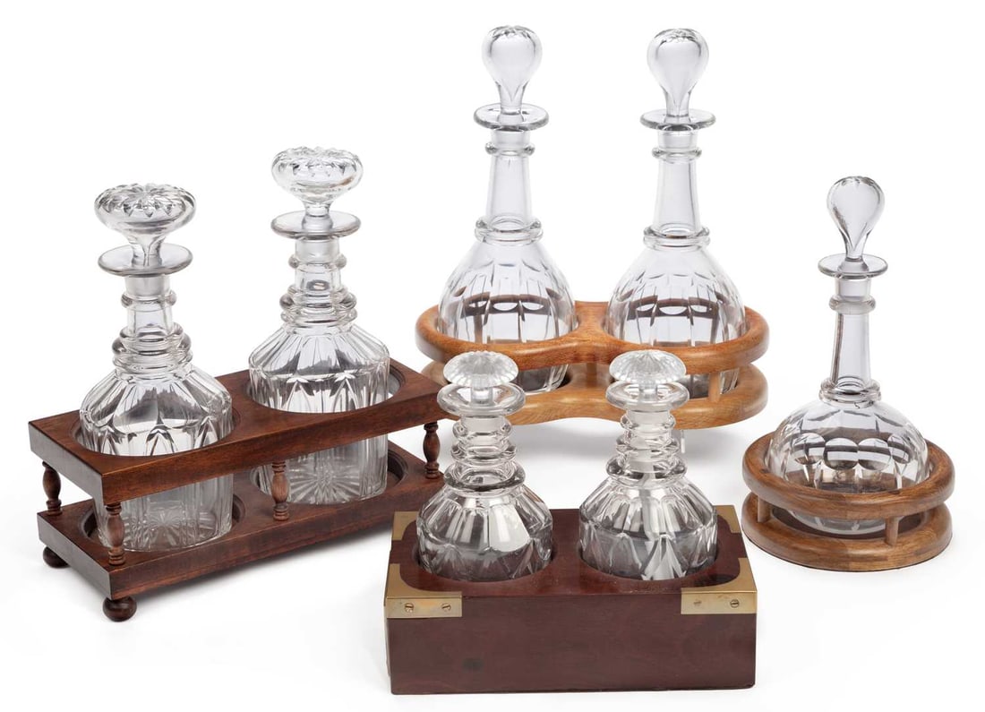 SEVEN CUT-GLASS DECANTERS AND FOUR STANDS (1 of 1)