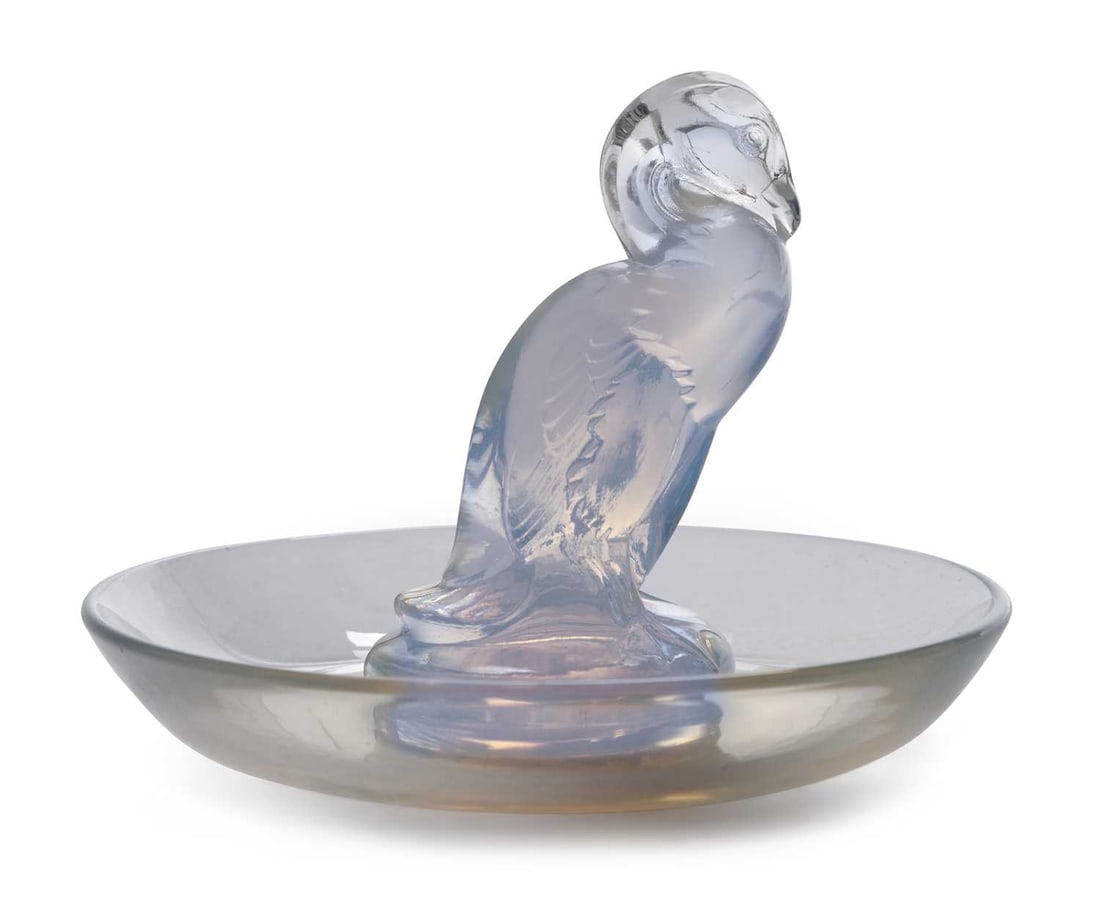 RENE LALIQUE (FRENCH, 1860-1945) A CANARD CENDRIER, DESIGNED 1925: opalescent glass, etched R. Lalique France No 283. 9.7cm diameter The tip of the bill is smooth and rounded and appears not to be damaged but is short. Surface scratches to the base but no other visib