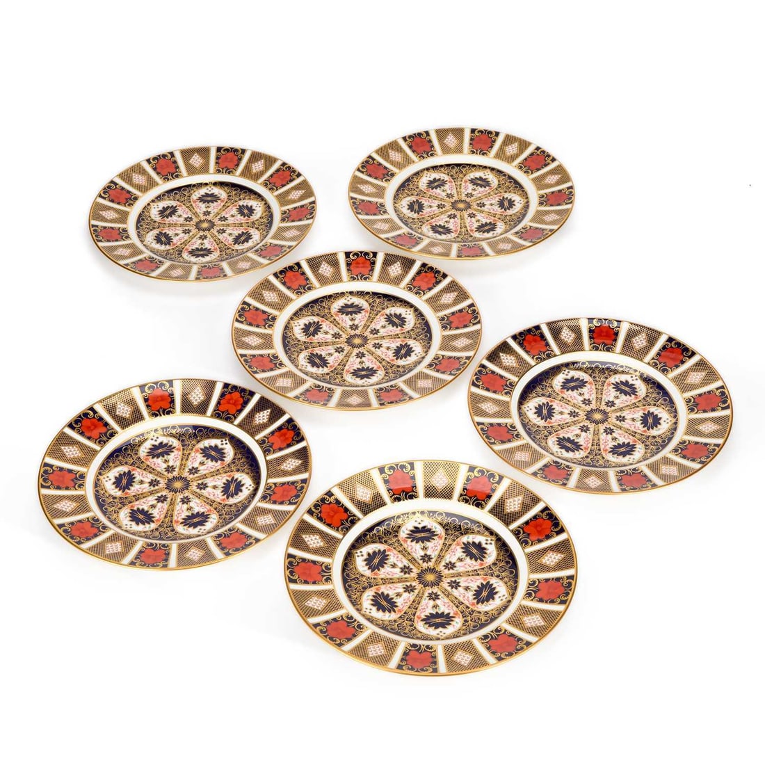 A SET OF SIX ROYAL CROWN DERBY DINNER PLATES: Imari 1128 pattern, of first quality, printed factory marks, dated 2001. (6) 27cm diameter