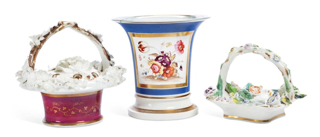 THREE PIECES OF ROCKINGHAM PORCELAIN CIRCA 1835: consisting of a flower encrusted pot pourri and cover, in the form of a basket, with gilt decoration on a claret ground; a squared pin tray with overhead handle and encrusted with flowers; and a flare