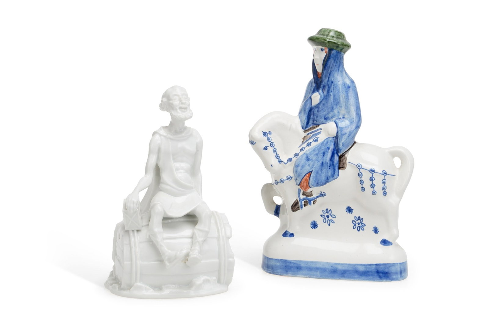 A ROSENTHAL FIGURE AND A RYE POTTERY FIGURE 20TH CENTURY: the Rosenthal figure modelled in the white as Diogenes in a barrel, by G.Pitzler; and a Rye Pottery figure of a pilgrim astride a horse, from the Canterbury Tales series. (2) 18cm high