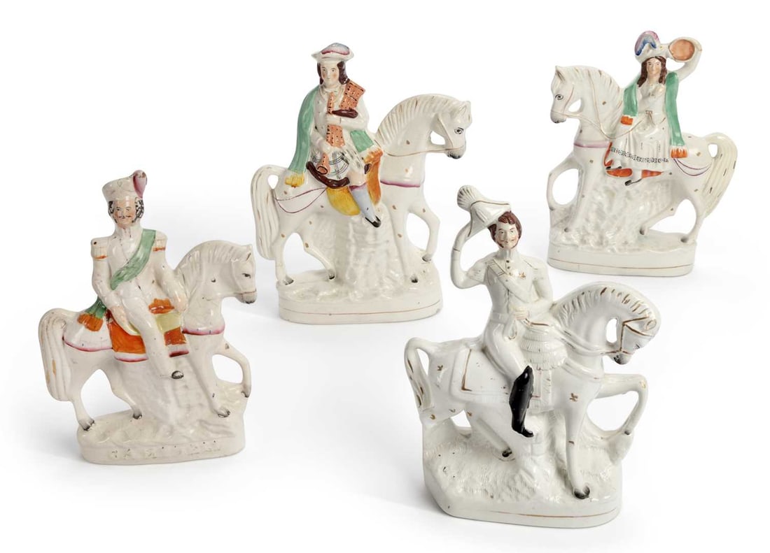FOUR STAFFORDSHIRE EQUESTRIAN FIGURES CIRCA 1860: comprising of a pair of musicians riding horses; and two Crimean War generals astride horses, one titled Campbell. (4) First 30cm high