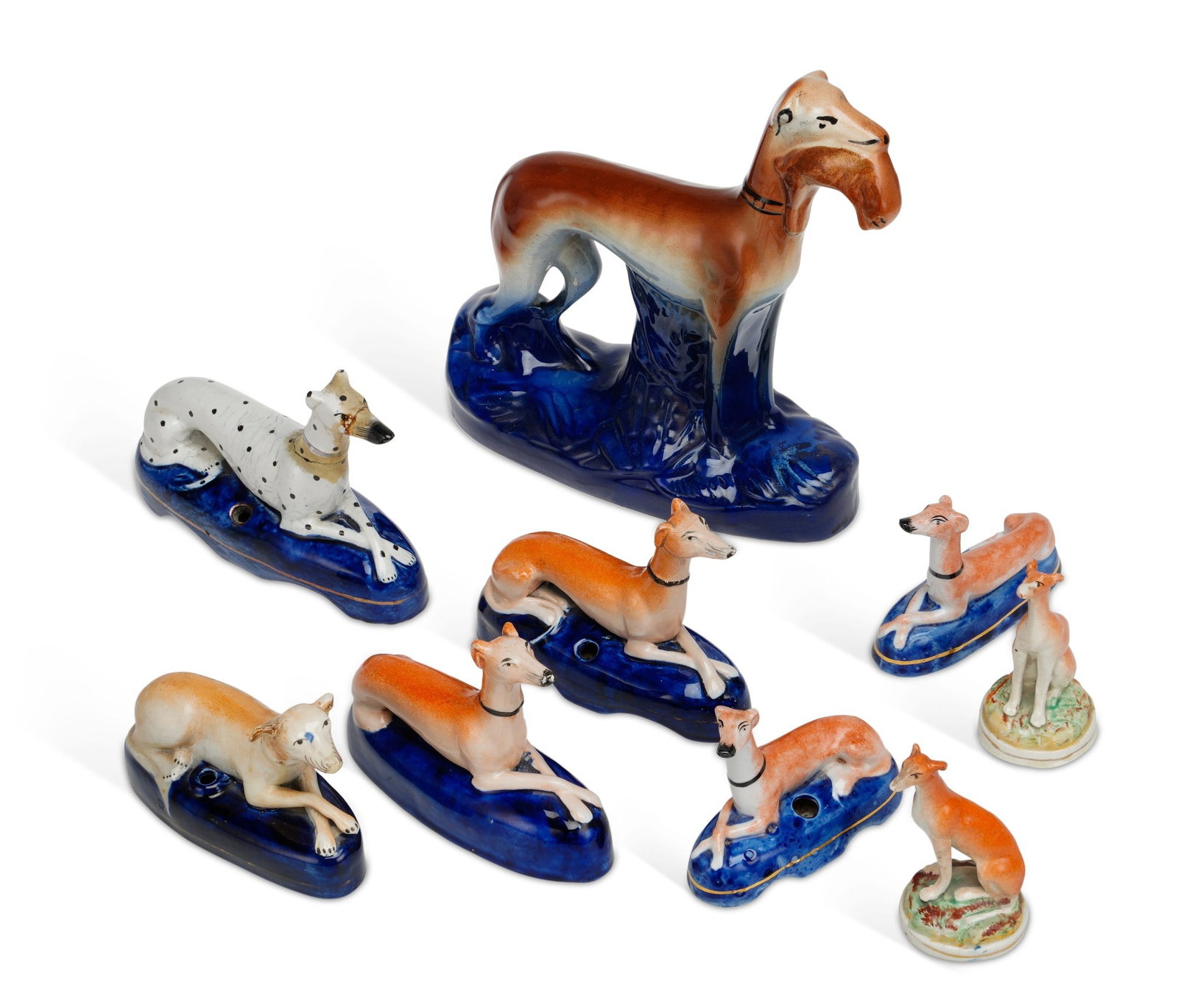 A GROUP OF STAFFORDSHIRE POTTERY GREYHOUNDS 19TH CENTURY (1 of 1)
