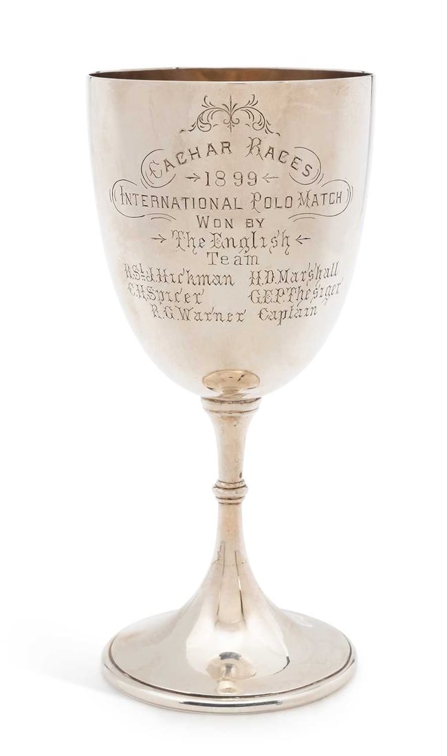 A 19TH CENTURY INDIAN SILVER PRESENTATION TROPHY CUP: by Hamilton & Co., Calcutta, the goblet with ovoid bowl raised on a circular knopped stem and domed foot, bearing engraved presentation inscription Cachar Races 1899 International Polo Match Won by Th