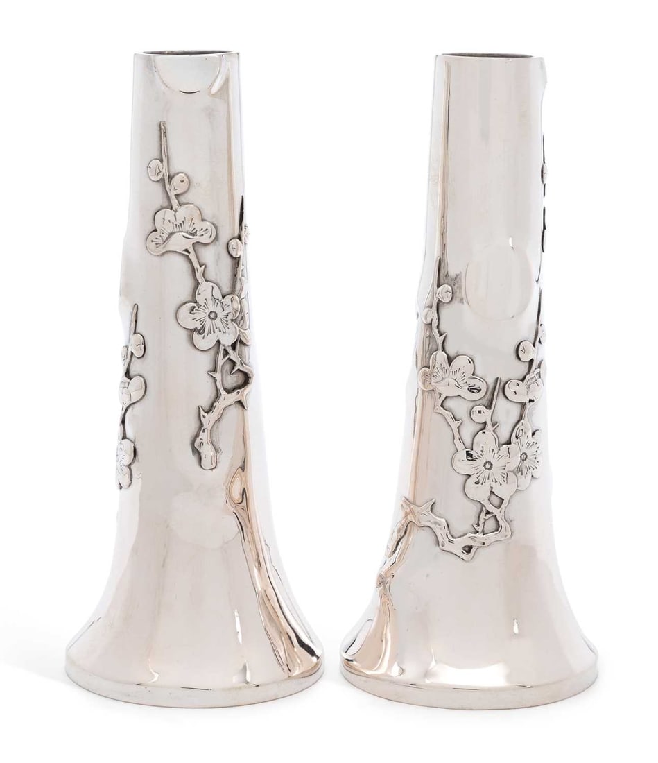 A PAIR OF CHINESE EXPORT SILVER VASES EARLY 20TH CENTURY: by Yok Sang, of tapering circular form, chased with prunus. (2) 13.5cm high, 5.4 troy ounces gross Good condition commensurate with age and use.